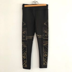 Black and gold leggings